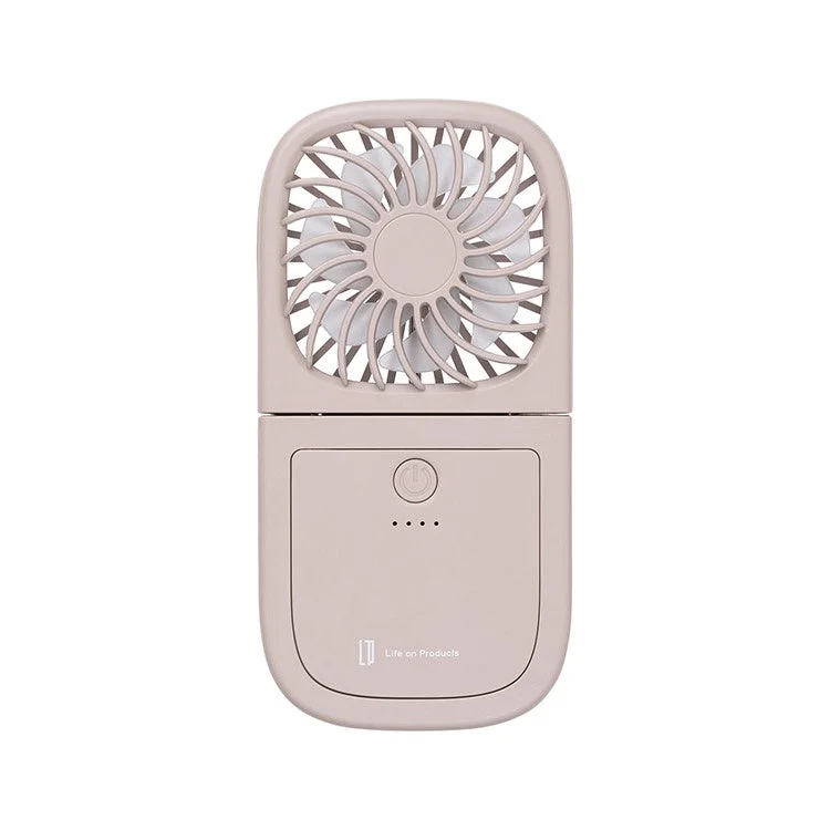 淡いベージュ色の折りたたみ式ハンディファンです。